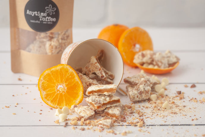 Buy toffee that tastes like a creamsicle.  Shop toffee with white chocolate and orange flavor.